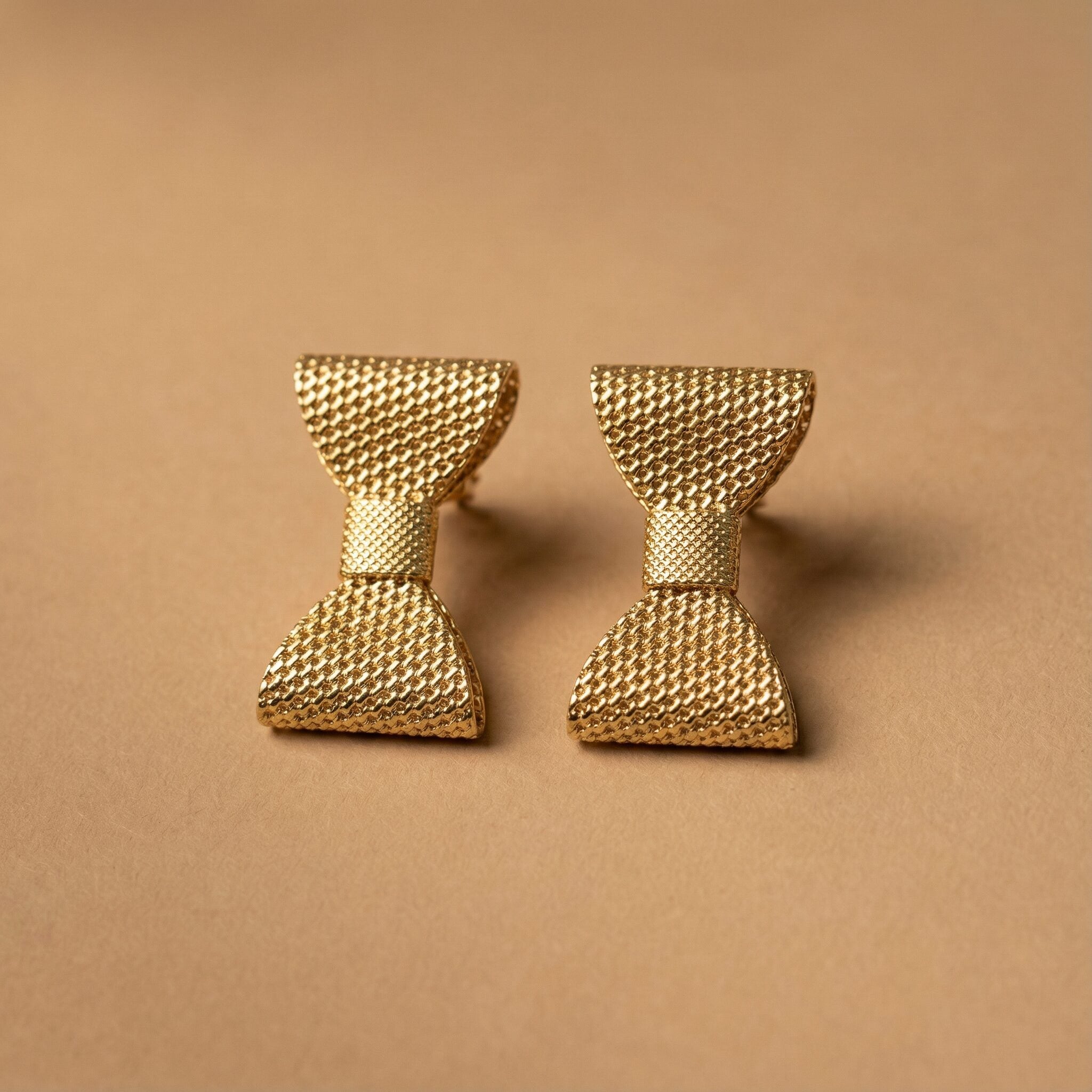 Aretes Moño